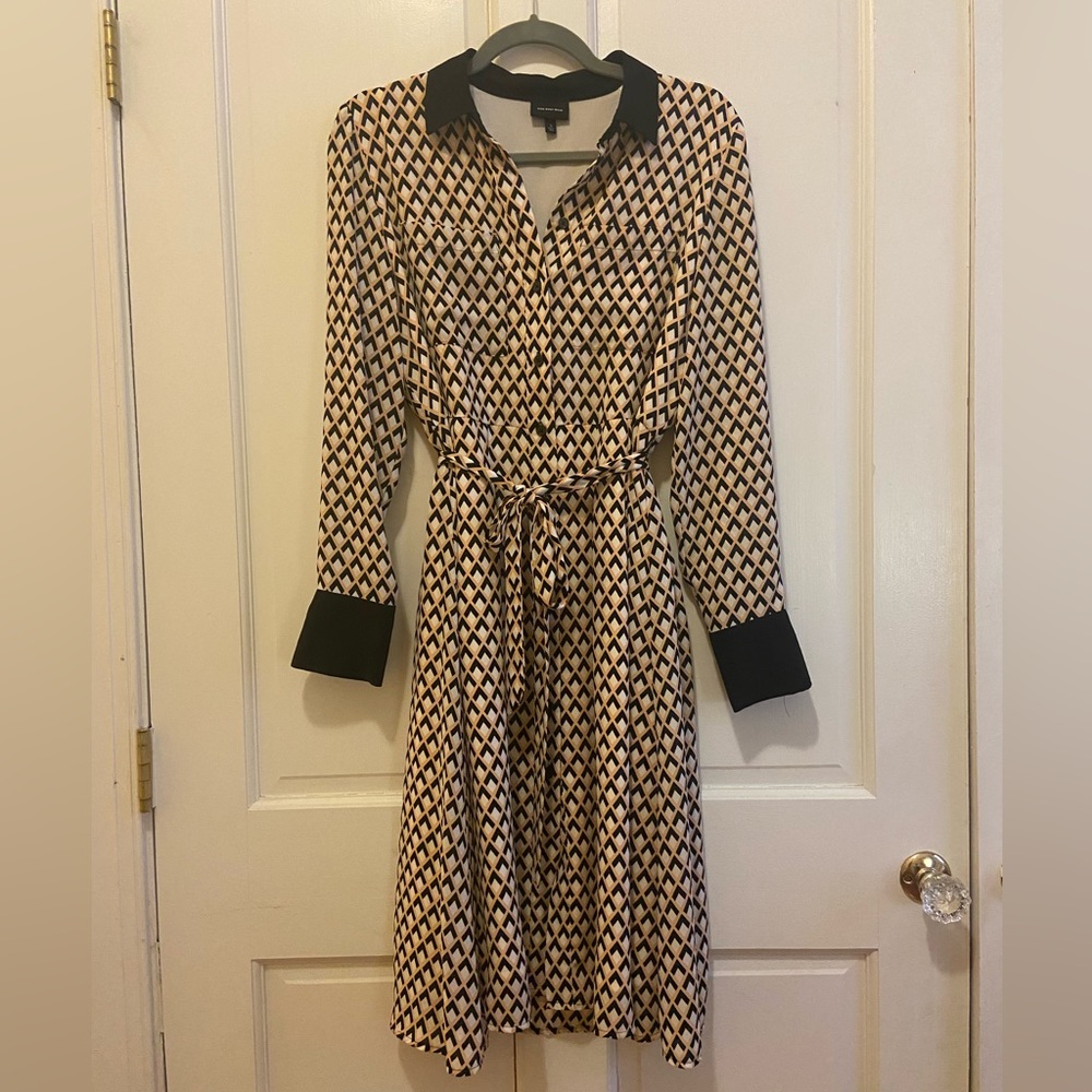 Who What Where dress. White with black and peach accents.
